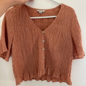Light pink American eagle top, great condition, medium